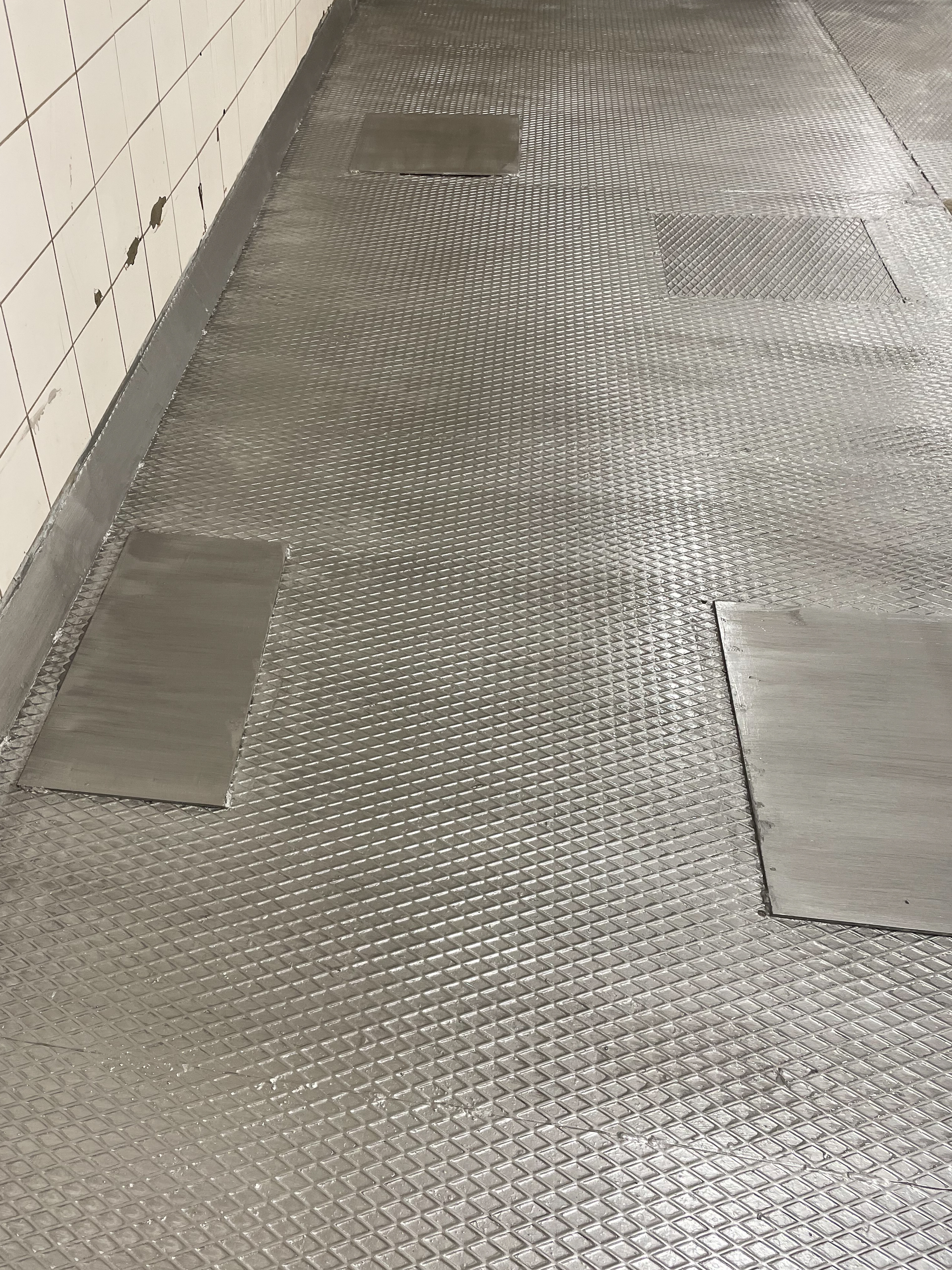 Chequer plate floor after application of the RD system